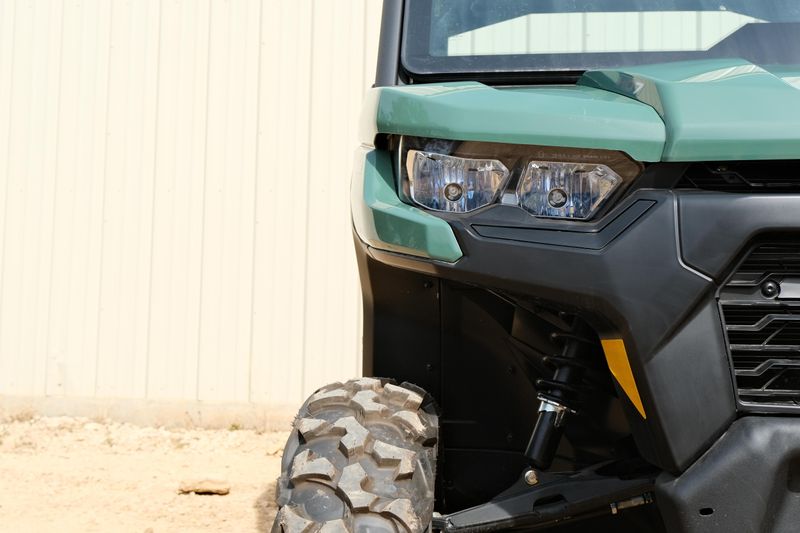 NEW 2026 CAN-AM DEFENDER MAX DPS HD7  in a COMPASS GREEN exterior color. Family PowerSports (877) 886-1997 familypowersports.com 