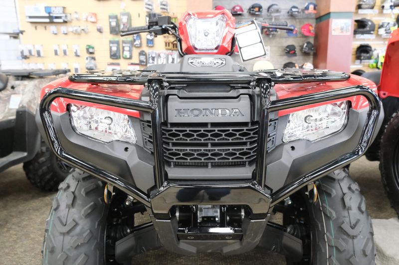 NEW 2026 HONDA FOREMAN 4X4 EPS  in a HERO RED exterior color. Family PowerSports (877) 886-1997 familypowersports.com 