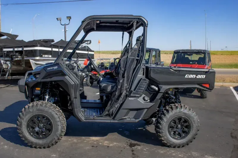 NEW 2026 CAN-AM DEFENDER XT HD11 WITH 1025 INCH TOUCHSCREEN  in a STEALTH BLACK exterior color. Family PowerSports (877) 886-1997 familypowersports.com