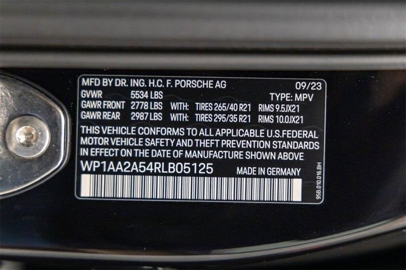 2024 Porsche Macan  in a Jet Black Metallic exterior color and Black/Mojave Beigeinterior. Lotus Manhattan 347-395-5714 lotusmanhattan.com 