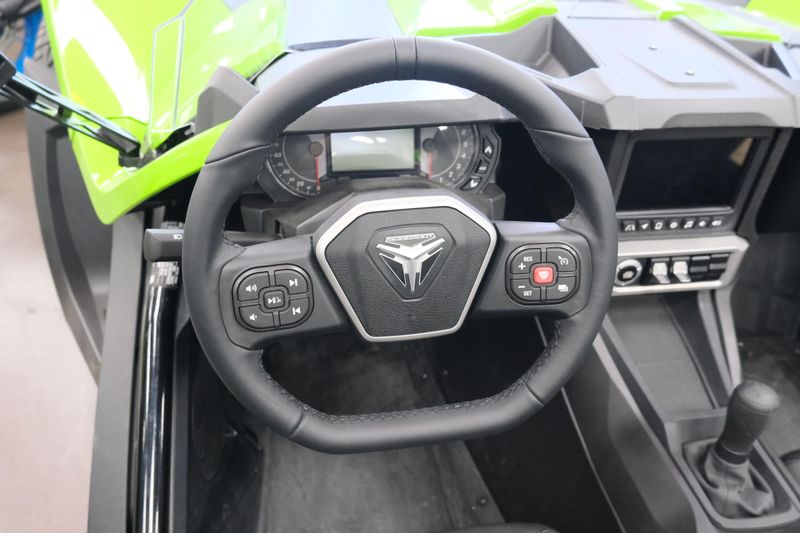 NEW 2025 POLARIS SLINGSHOT SL MANUAL  in a LIQUID LIME exterior color. Family PowerSports (877) 886-1997 familypowersports.com 