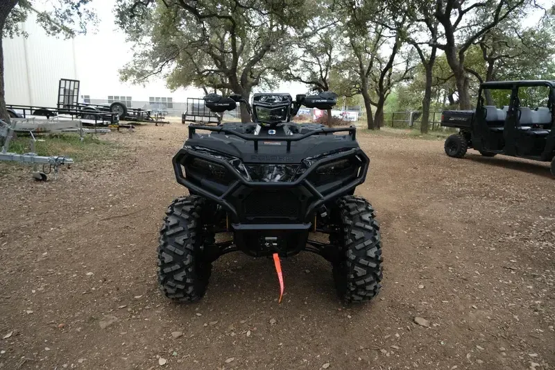 2025 POLARIS SPORTSMAN 570 TRAIL ONYX BLACK in a ONYX BLACK exterior color. Family PowerSports (877) 886-1997 familypowersports.com 