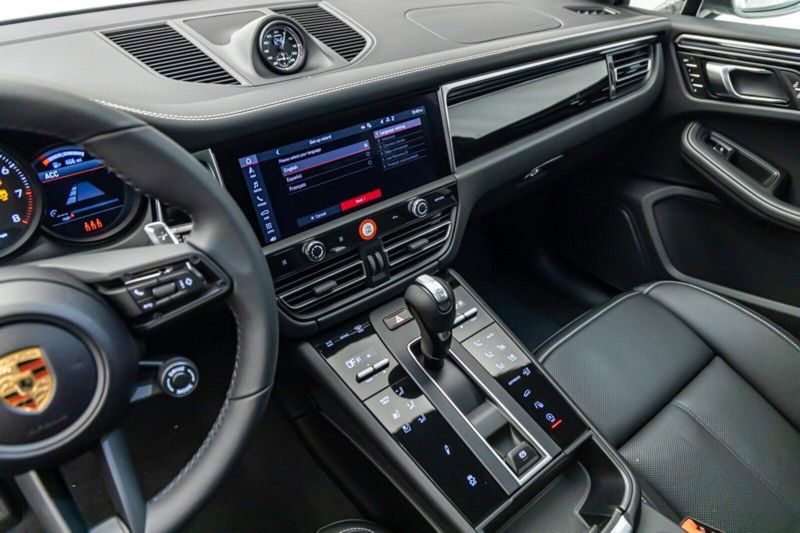 2024 Porsche Macan T in a Carrara White Metallic exterior color and Black w/Chalk Stitchinginterior. Lotus Manhattan 347-395-5714 lotusmanhattan.com 