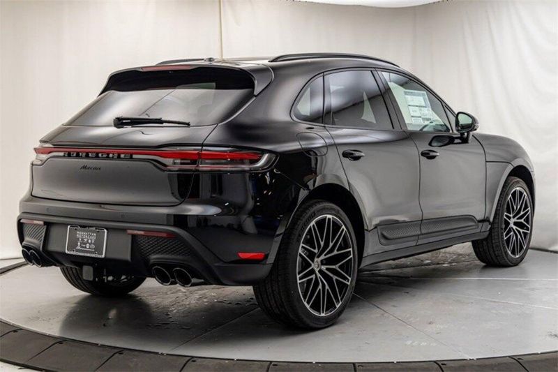 2024 Porsche Macan  in a Jet Black Metallic exterior color and Black/Mojave Beigeinterior. Lotus Manhattan 347-395-5714 lotusmanhattan.com 