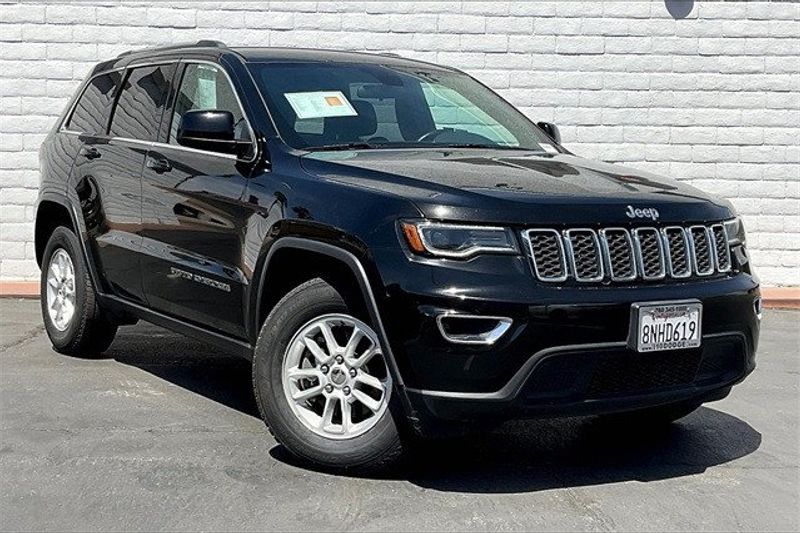 2020 Jeep Grand Cherokee Laredo E in a Diamond Black Crystal Pearl Coat exterior color and Blackinterior. I-10 Chrysler Dodge Jeep Ram (760) 565-5160 pixelmotiondemo.com 