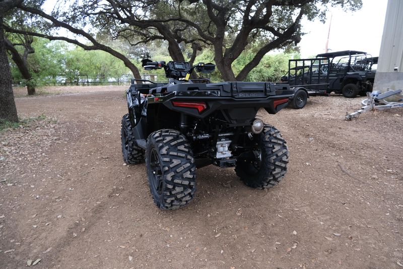 2025 POLARIS SPORTSMAN 570 TRAIL ONYX BLACK in a ONYX BLACK exterior color. Family PowerSports (877) 886-1997 familypowersports.com 