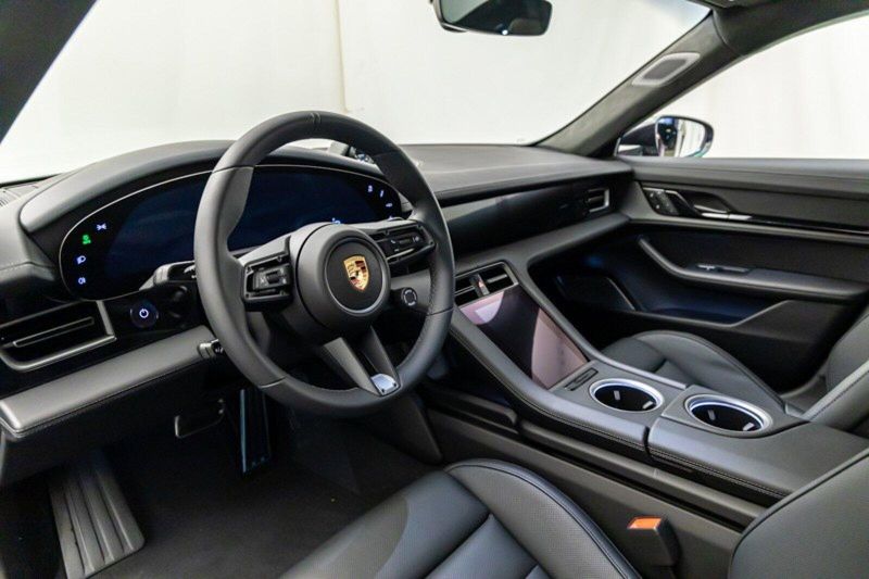 2024 Porsche Taycan Turbo in a Jet Black Metallic exterior color and Blackinterior. Lotus Manhattan 347-395-5714 lotusmanhattan.com 