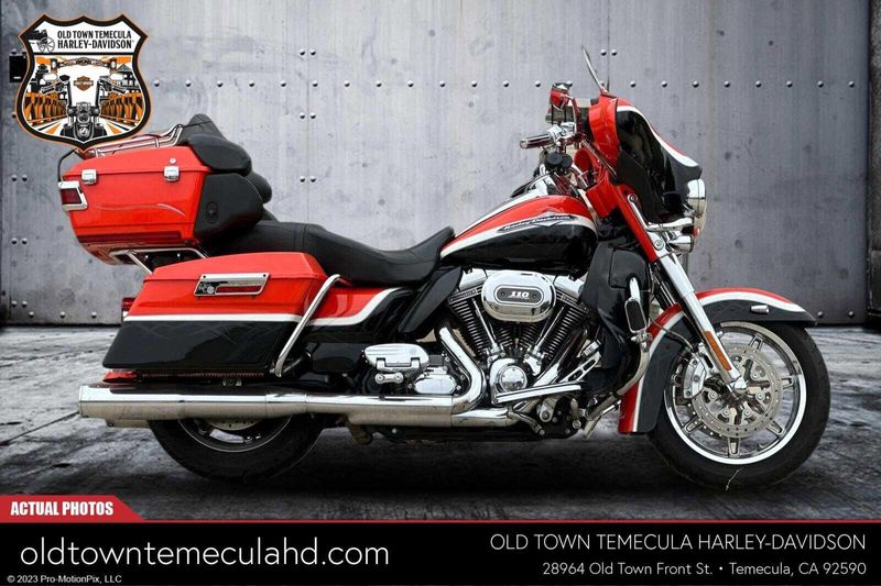 2012 Harley-Davidson Electra Glide in a ELE ORG/BLK DIA W/ PINSTRIP exterior color. BMW Motorcycles of Temecula – Southern California (951) 506-6903 bmwmotorcyclesoftemecula.com 