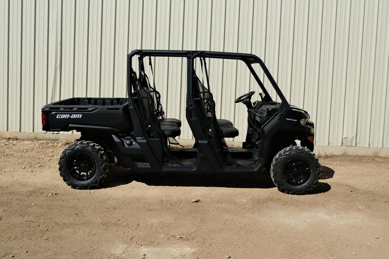 NEW 2026 CAN-AM DEFENDER MAX DPS HD9  in a STEALTH BLACK exterior color. Family PowerSports (877) 886-1997 familypowersports.com 