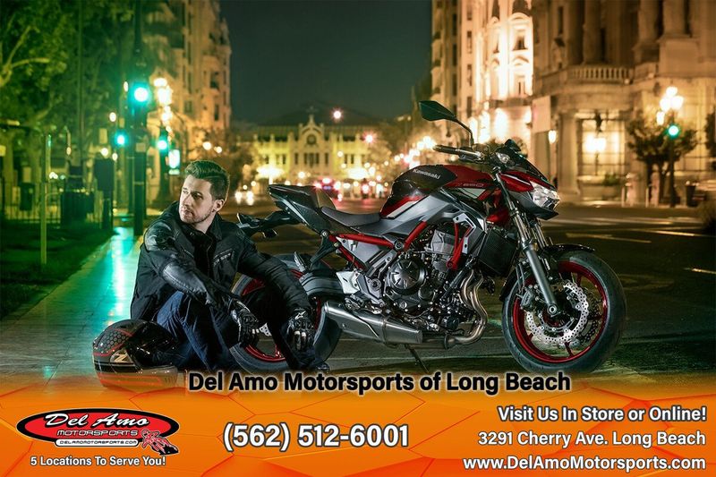 2024 Kawasaki ER650NRFAL-RD1  in a CANDY PERSIMMON RED/EBONY exterior color. Del Amo Motorsports of Long Beach (562) 362-3160 delamomotorsports.com 