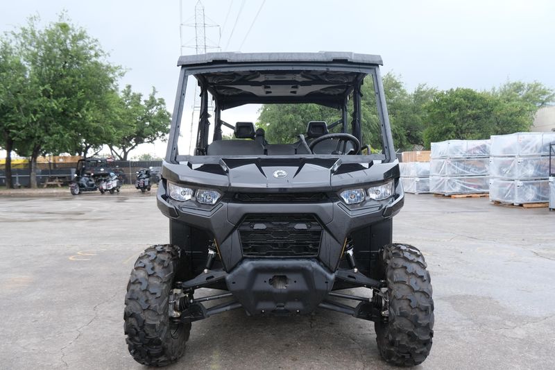 NEW 2026 CAN-AM DEFENDER MAX DPS HD9  in a STEALTH BLACK exterior color. Family PowerSports (877) 886-1997 familypowersports.com 