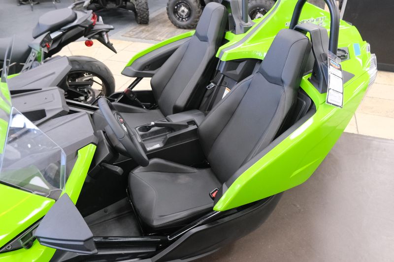 NEW 2025 POLARIS SLINGSHOT SL MANUAL  in a LIQUID LIME exterior color. Family PowerSports (877) 886-1997 familypowersports.com 