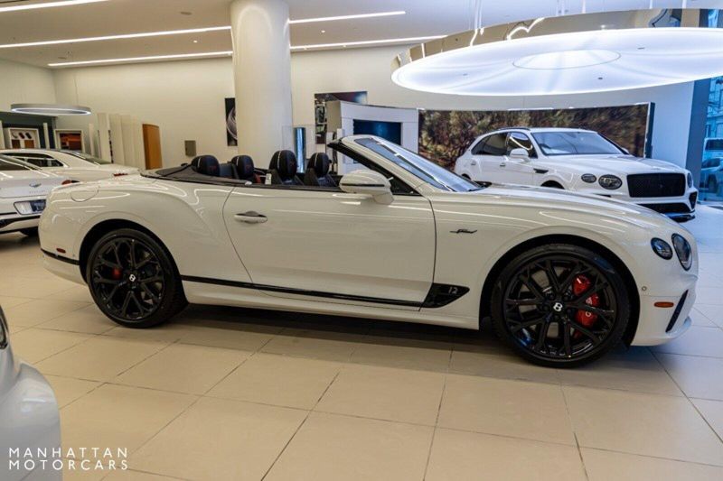 2024 Bentley Continental GT Speed Convertible in a Glacier White exterior color and Hotspur & Belugainterior. Lotus Manhattan 347-395-5714 lotusmanhattan.com 