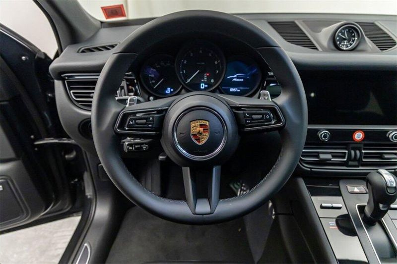 2024 Porsche Macan  in a Volcano Grey Metallic exterior color and Blackinterior. Lotus Manhattan 347-395-5714 lotusmanhattan.com 