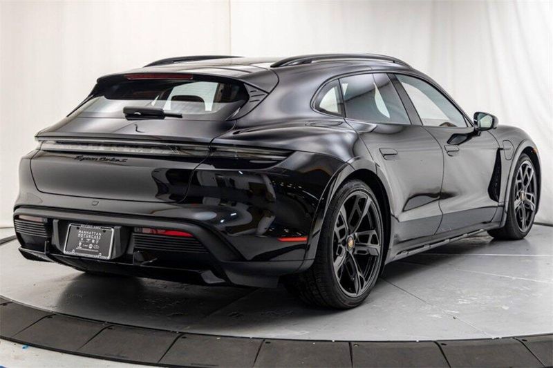 2023 Porsche Taycan Turbo S in a Jet Black Metallic exterior color and Truffle Browninterior. Lotus Manhattan 347-395-5714 lotusmanhattan.com 