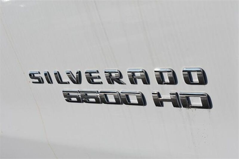 2023 Chevrolet Silverado 5500HD Work Truck in a Summit White exterior color and Dark Ash Seats With Jet Black Interior Accentsinterior. Raymond Auto Group 888-703-9950 raymonddeals.com 