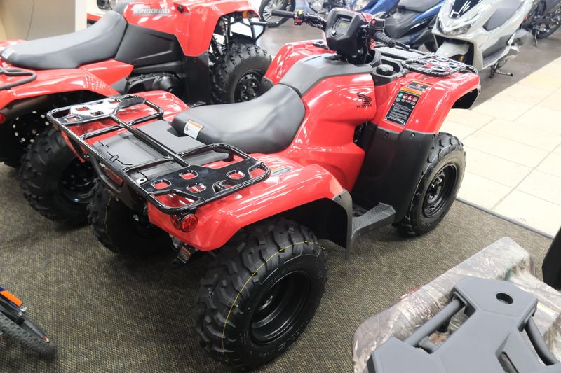 NEW 2026 HONDA FOREMAN 4X4 EPS  in a HERO RED exterior color. Family PowerSports (877) 886-1997 familypowersports.com 