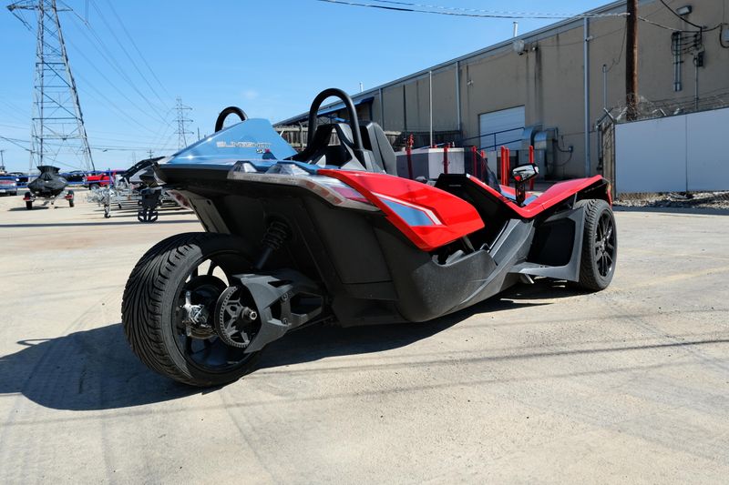 NEW 2025 POLARIS SLINGSHOT SLR AUTODRIVE  in a ROYAL RED exterior color. Family PowerSports (877) 886-1997 familypowersports.com 