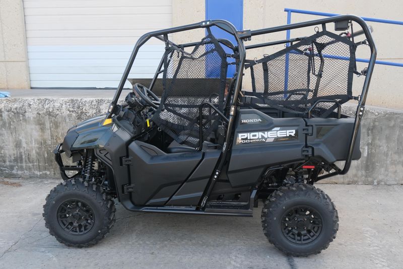 NEW 2026 HONDA PIONEER 7004 DELUXE  in a BLACK FOREST GREEN exterior color. Family PowerSports (877) 886-1997 familypowersports.com