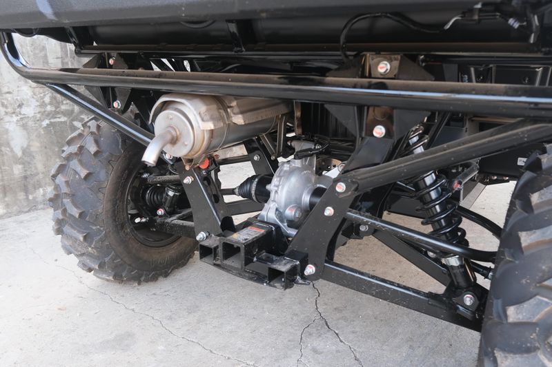 NEW 2026 HONDA PIONEER 7004 DELUXE  in a BLACK FOREST GREEN exterior color. Family PowerSports (877) 886-1997 familypowersports.com