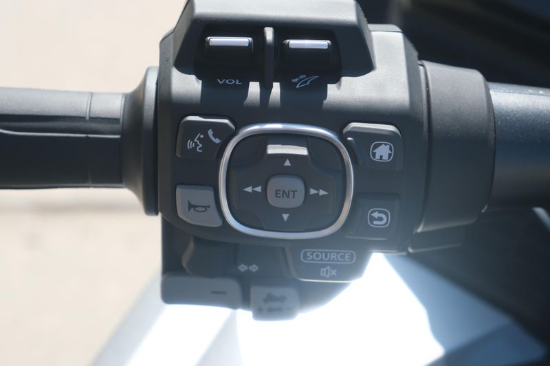 NEW 2025 HONDA GOLD WING TOUR DCT  in a LIGHT SILVER METALLIC exterior color. Family PowerSports (877) 886-1997 familypowersports.com 