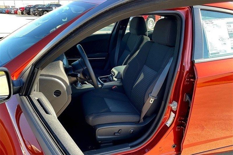 2023 Dodge Charger SXT Rwd in a Sinamon Stick exterior color and Blackinterior. Elder CDJR Cedar Creek 430-558-0679 eldercedarcreek.com 