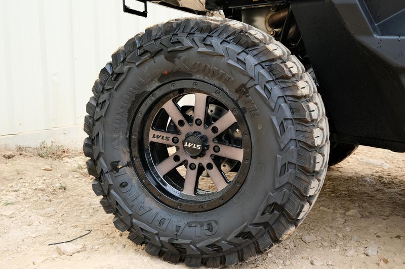 NEW 2026 CAN-AM DEFENDER MAX XT HD11 WITH 1025 INCH TOUCHSCREEN  in a STEALTH BLACK exterior color. Family PowerSports (877) 886-1997 familypowersports.com 