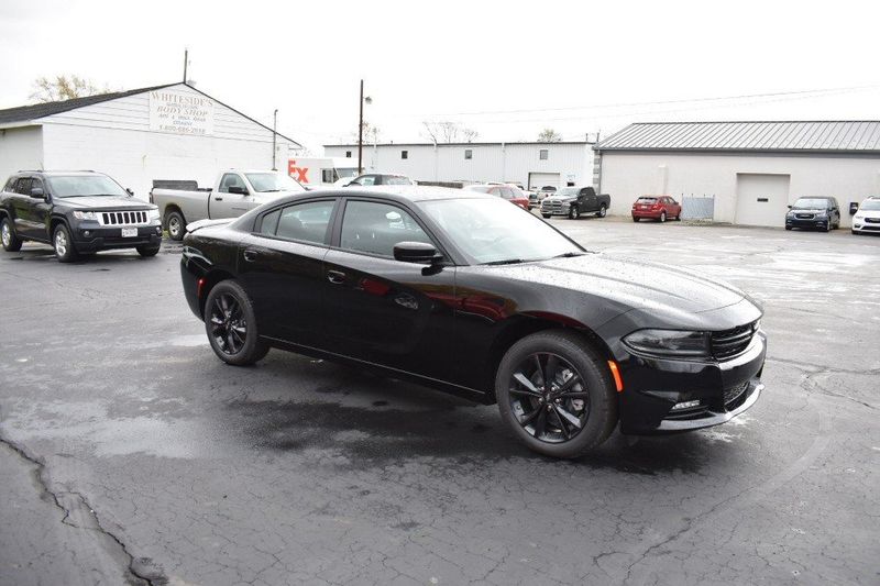 2023 Dodge Charger SXT in a Pitch Black exterior color and Blackinterior. Tom Whiteside Auto Sales 740-831-2535 whitesidecars.com 