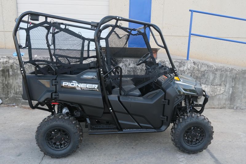 NEW 2026 HONDA PIONEER 7004 DELUXE  in a BLACK FOREST GREEN exterior color. Family PowerSports (877) 886-1997 familypowersports.com