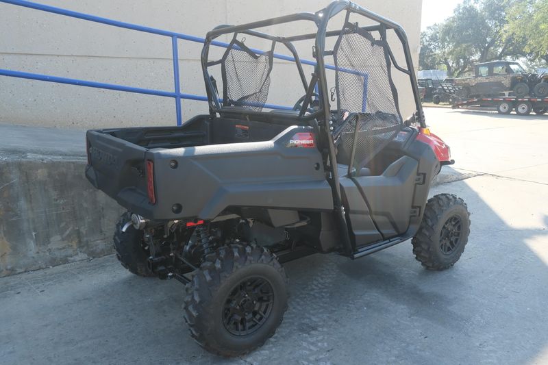 NEW 2026 HONDA PIONEER 700 DELUXE  in a HERO RED exterior color. Family PowerSports (877) 886-1997 familypowersports.com