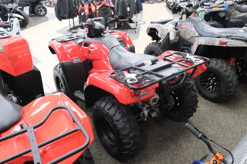 NEW 2026 HONDA FOREMAN 4X4 EPS  in a HERO RED exterior color. Family PowerSports (877) 886-1997 familypowersports.com 