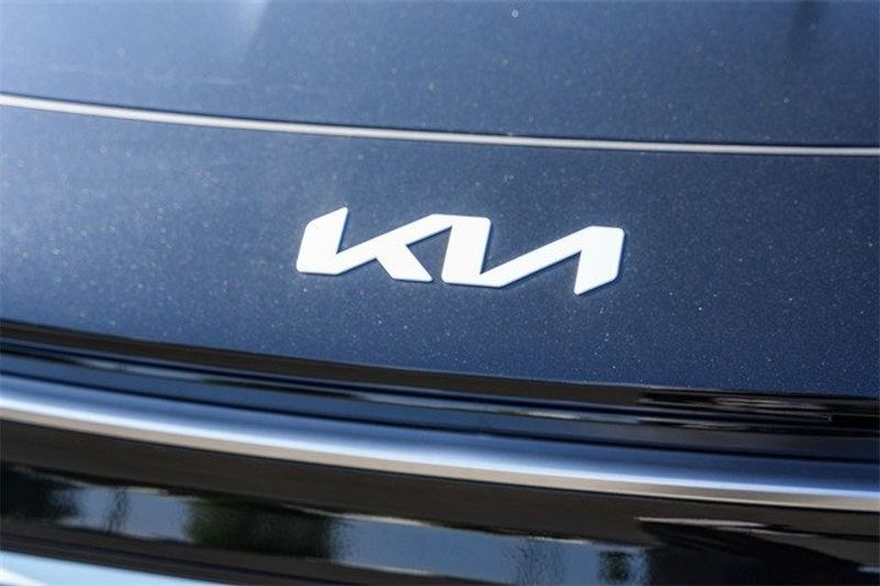 2024 Kia Niro EX Touring in a Aurora Black exterior color and Grayinterior. BEACH BLVD OF CARS beachblvdofcars.com 