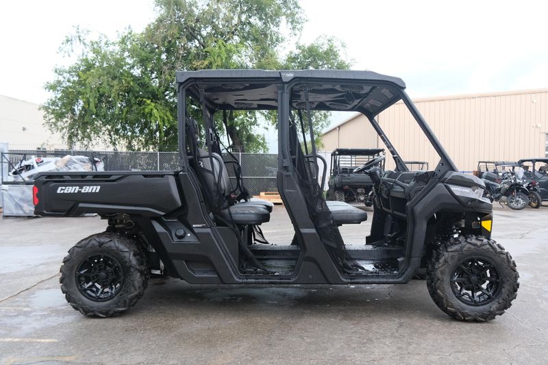 NEW 2026 CAN-AM DEFENDER MAX DPS HD9  in a STEALTH BLACK exterior color. Family PowerSports (877) 886-1997 familypowersports.com 