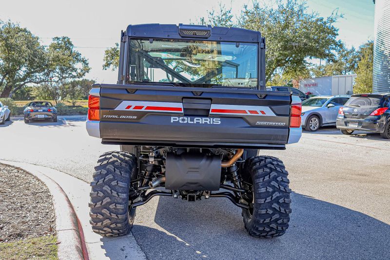 2025 Polaris RANGER XP 1000 NORTHSTAR TRAIL BOSS EDITION CRYSTAL WHITE WITH PERFORMANCE RED ACCENTSImage 2