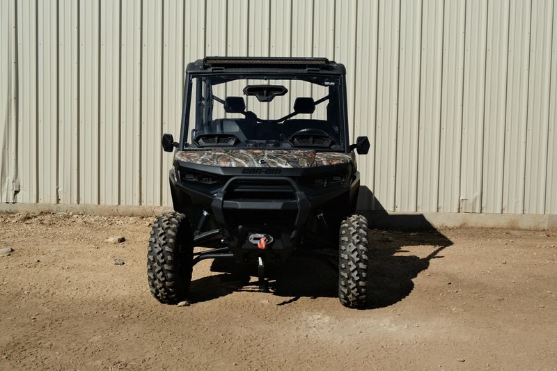 NEW 2026 CAN-AM DEFENDER MAX XT HD11 WITH 1025 INCH TOUCHSCREEN  in a DARK WILDLAND CAMO exterior color. Family PowerSports (877) 886-1997 familypowersports.com 