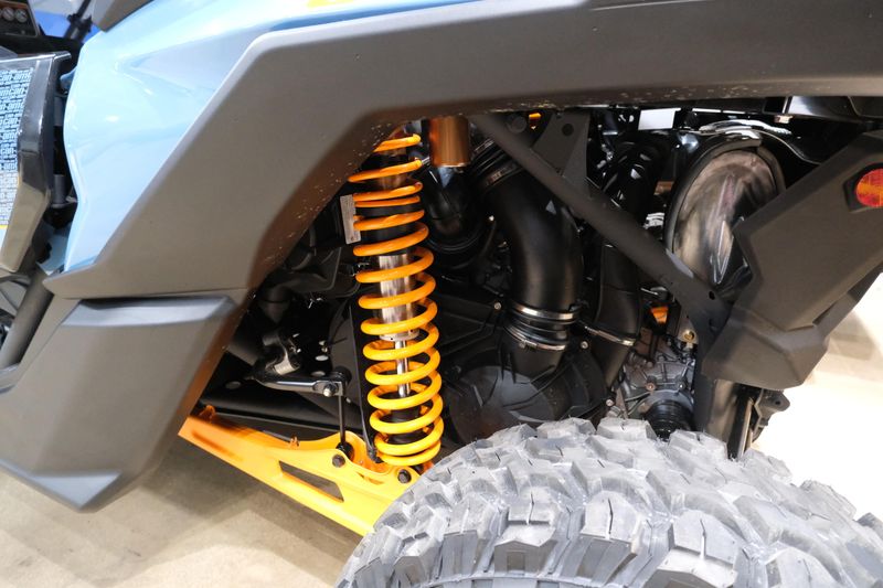 2025 CAN-AM MAVERICK X3 MAX DS TURBO SCANDI BLUE AND ORANGE CRUSH in a SCANDI BLUE AND ORANGE CRUSH exterior color. Family PowerSports (877) 886-1997 familypowersports.com 