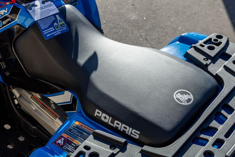 2024 POLARIS ATV24SPORTSMAN 110BLUE in a BLUE exterior color. Family PowerSports (877) 886-1997 familypowersports.com 