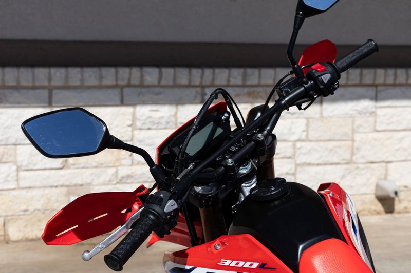 2024 HONDA CRF300L ABS RED in a RED exterior color. Family PowerSports (877) 886-1997 familypowersports.com 