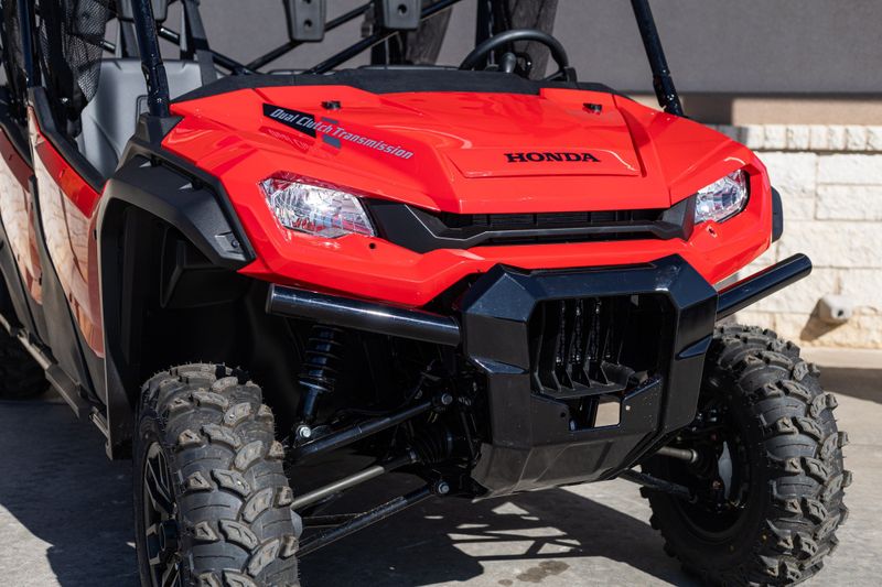 2023 HONDA Pioneer 10006 Crew Deluxe in a RED exterior color. Family PowerSports (877) 886-1997 familypowersports.com 