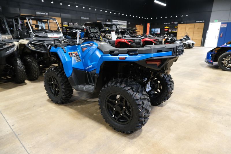 2025 POLARIS SPORTSMAN 570 TRAIL ELECTRIC BLUE in a ELECTRIC BLUE exterior color. Family PowerSports (877) 886-1997 familypowersports.com 