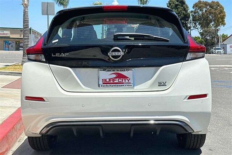 2023 Nissan Leaf SV Plus in a Pearl White Tri Coat exterior color and Blackinterior. BEACH BLVD OF CARS beachblvdofcars.com 