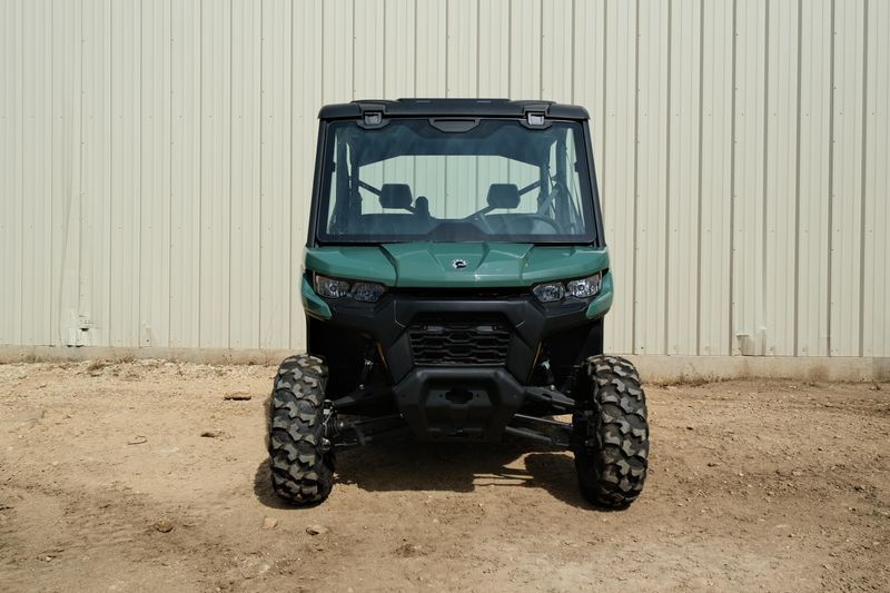 NEW 2026 CAN-AM DEFENDER MAX DPS HD7  in a COMPASS GREEN exterior color. Family PowerSports (877) 886-1997 familypowersports.com 