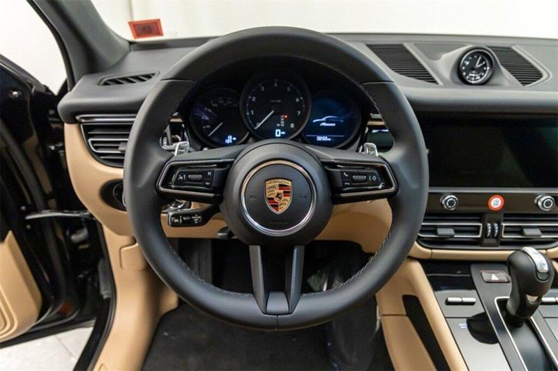 2024 Porsche Macan  in a Jet Black Metallic exterior color and Black/Mojave Beigeinterior. Lotus Manhattan 347-395-5714 lotusmanhattan.com 