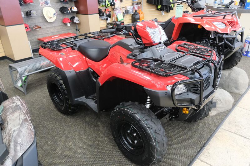 NEW 2026 HONDA FOREMAN 4X4 EPS  in a HERO RED exterior color. Family PowerSports (877) 886-1997 familypowersports.com 