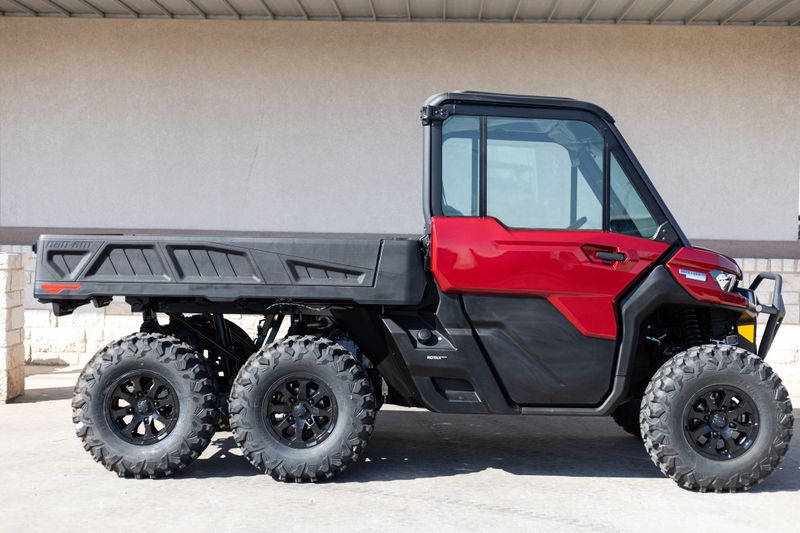 2024 CAN-AM SSV DEF 6X6 LTD 65 HD10 RD 24 in a RED exterior color. Family PowerSports (877) 886-1997 familypowersports.com 