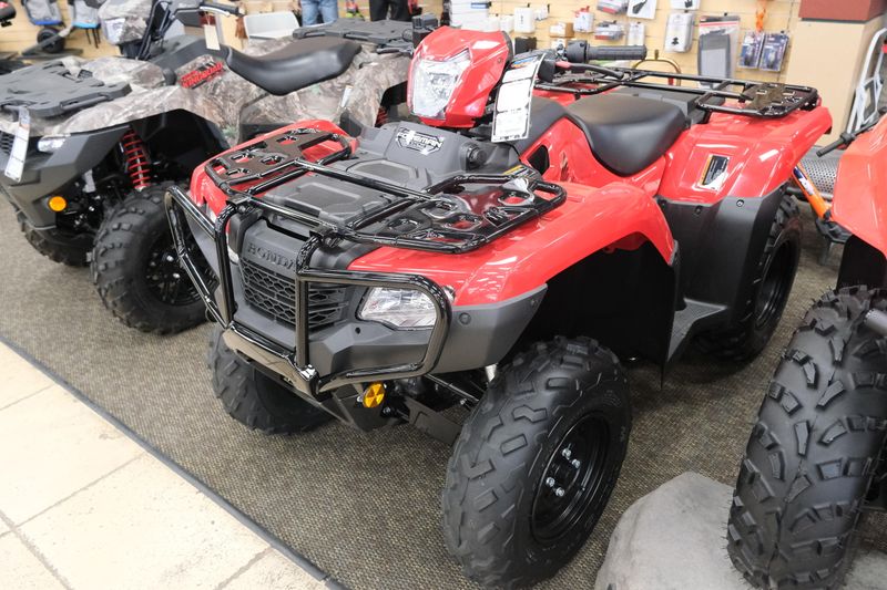 NEW 2026 HONDA FOREMAN 4X4 EPS  in a HERO RED exterior color. Family PowerSports (877) 886-1997 familypowersports.com 