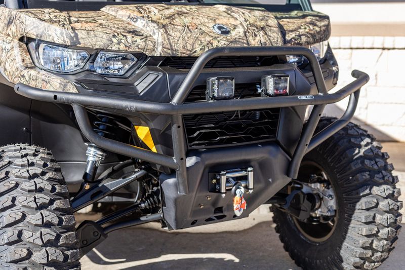 2023 CAN-AM SSV DEF MAX XT 64 HD10 BC CALI 23 in a CAMO exterior color. Family PowerSports (877) 886-1997 familypowersports.com 