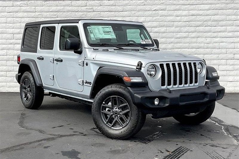 2024 Jeep Wrangler 4-door Sport S in a Silver Zynith Clear Coat exterior color and Blackinterior. Crystal Chrysler Jeep Dodge Ram (760) 507-2975 pixelmotiondemo.com 