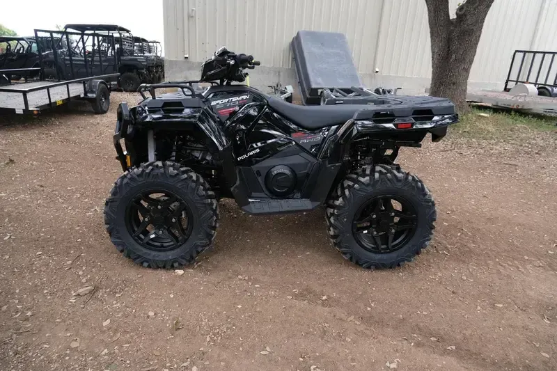 2025 POLARIS SPORTSMAN 570 TRAIL ONYX BLACK in a ONYX BLACK exterior color. Family PowerSports (877) 886-1997 familypowersports.com 