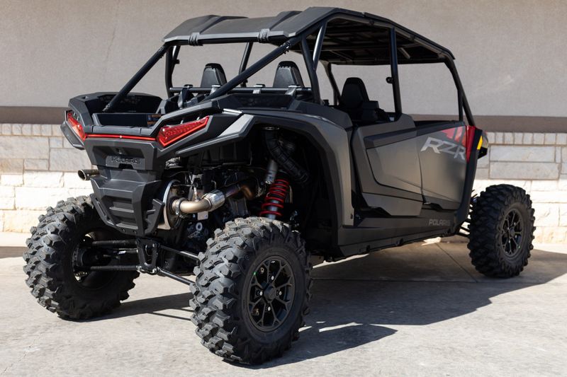 2024 POLARIS RZR XP 4 1000 ULTIMATE  INDY RED in a RED exterior color. Family PowerSports (877) 886-1997 familypowersports.com 